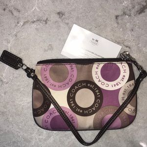 Coach signature collection wristlet